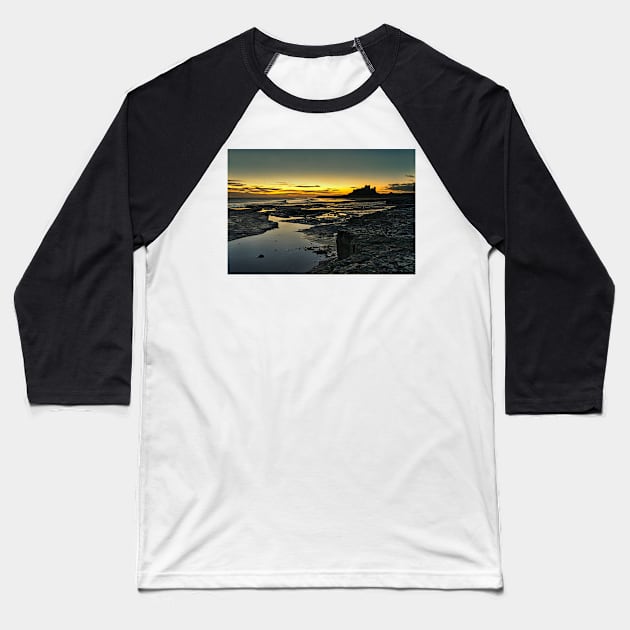 Bamburgh Sunrise Baseball T-Shirt by Reg-K-Atkinson